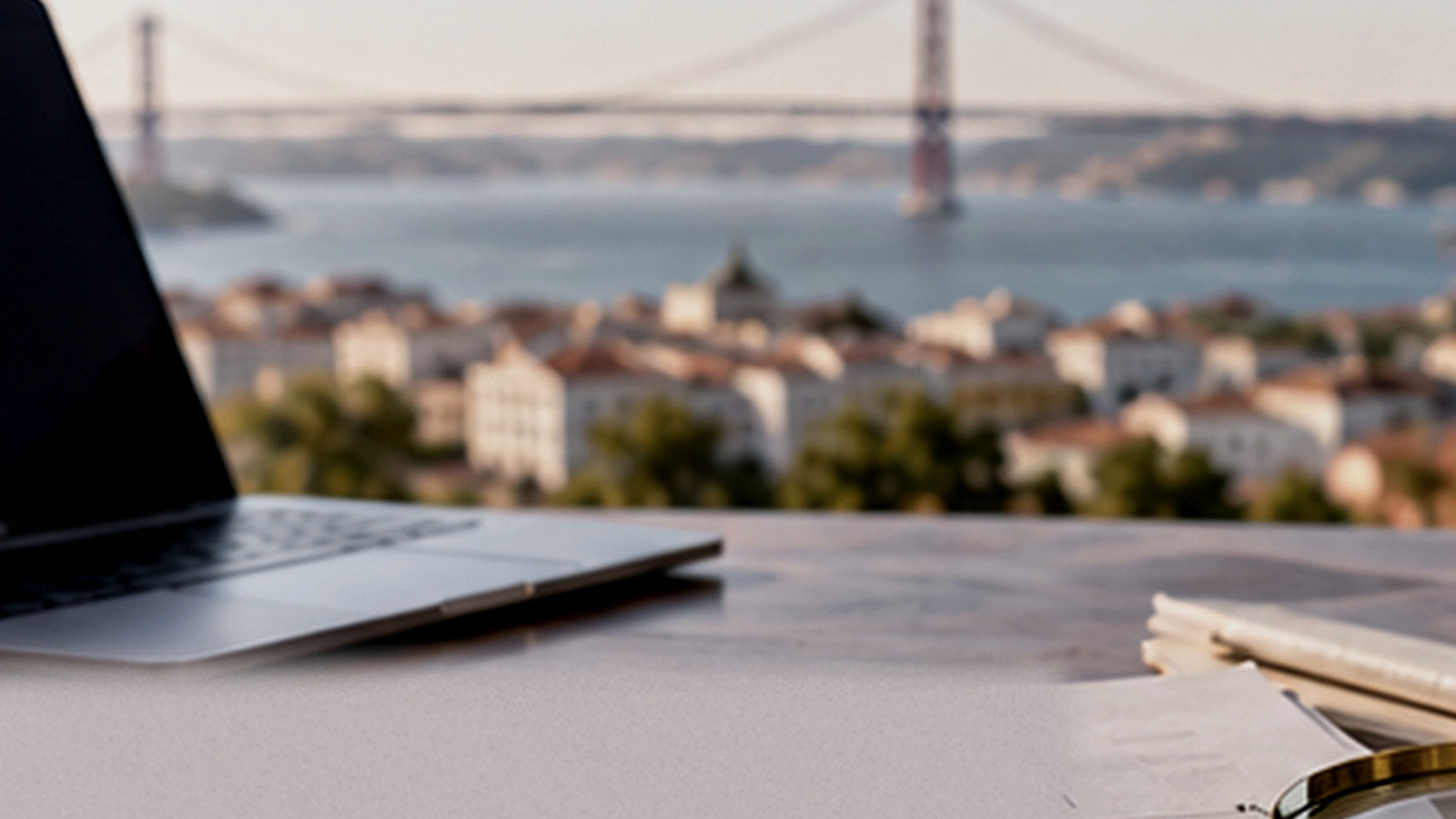 Darkened Lisbon office desk with a laptop overlooking the Tagus, illustrating debt enforcement and recovery.